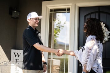 shaking hands with contractor