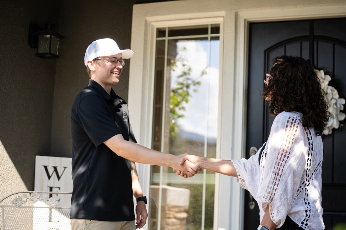 shaking hands with contractor