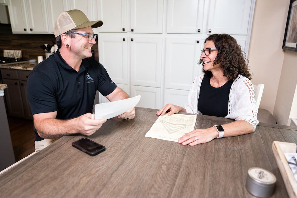 homeowner signing-contract-co